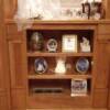 Natural cherry library/showcase with flutes and mini rope molding incorporated
