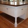 White with stained maple top and bottom island with bead board doors and posts